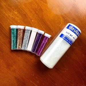Multicolored glitter in sprinkle containers